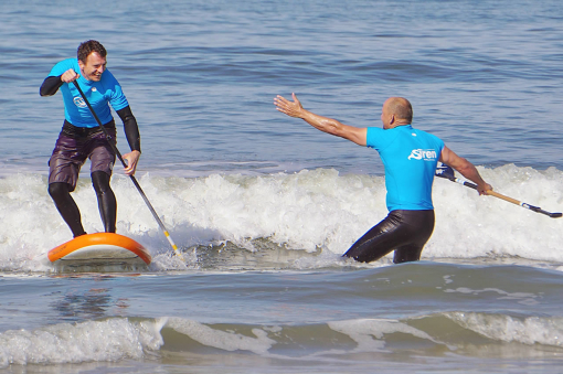 SUP Welle mit Lycra Shirt von SIREN SUPsurfing